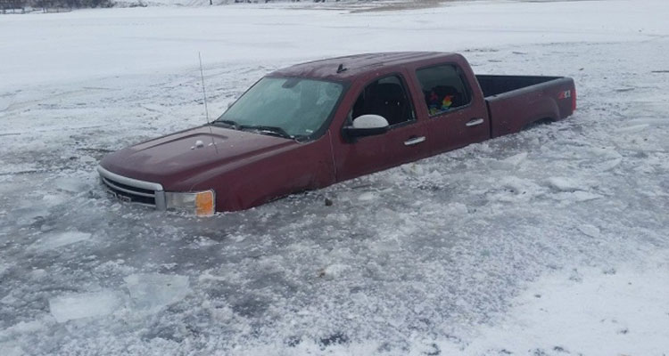 This truck is frozen solidly in the lake just off the shore of Regina Beach. (TRK Towing)