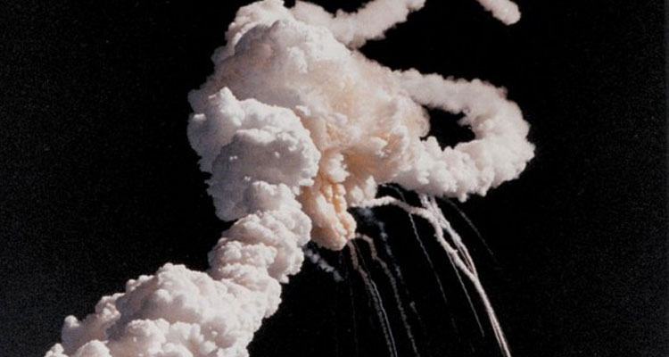 n January 28, 1986, the Space Shuttle Challenger and her seven-member crew were lost when a ruptured O-ring in the right Solid Rocket Booster caused an explosion soon after launch. This photograph, taken a few seconds after the accident, shows the Space Shuttle Main Engines and Solid Rocket Booster exhaust plumes entwined around a ball of gas from the External Tank. Because shuttle launches had become almost routine after 24 successful missions, those watching the shuttle launch in person and on television found the sight of the explosion especially shocking and difficult to believe until NASA confirmed the accident. Image and caption via Wikimedia Commons.